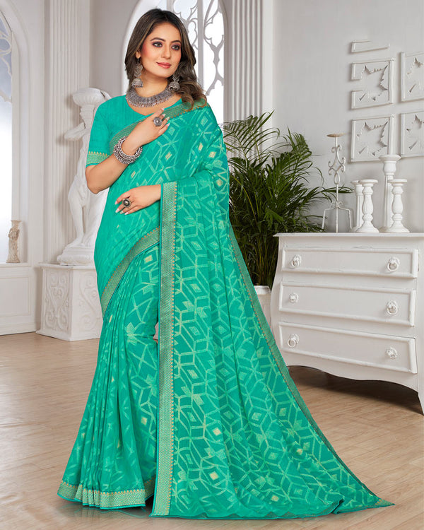 Vishal Prints Aqua Green Brasso Saree With Foil Print And Zari Border