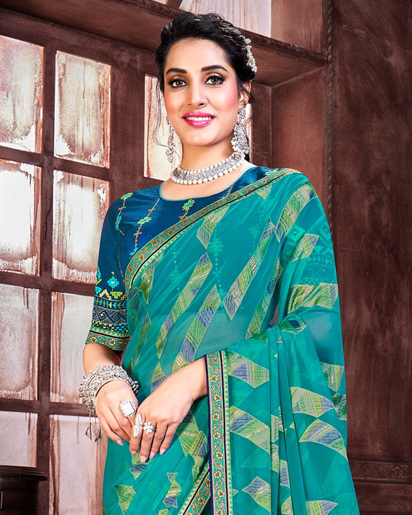 Vishal Prints Teal Blue Brasso Saree With Foil Print And Zari Border